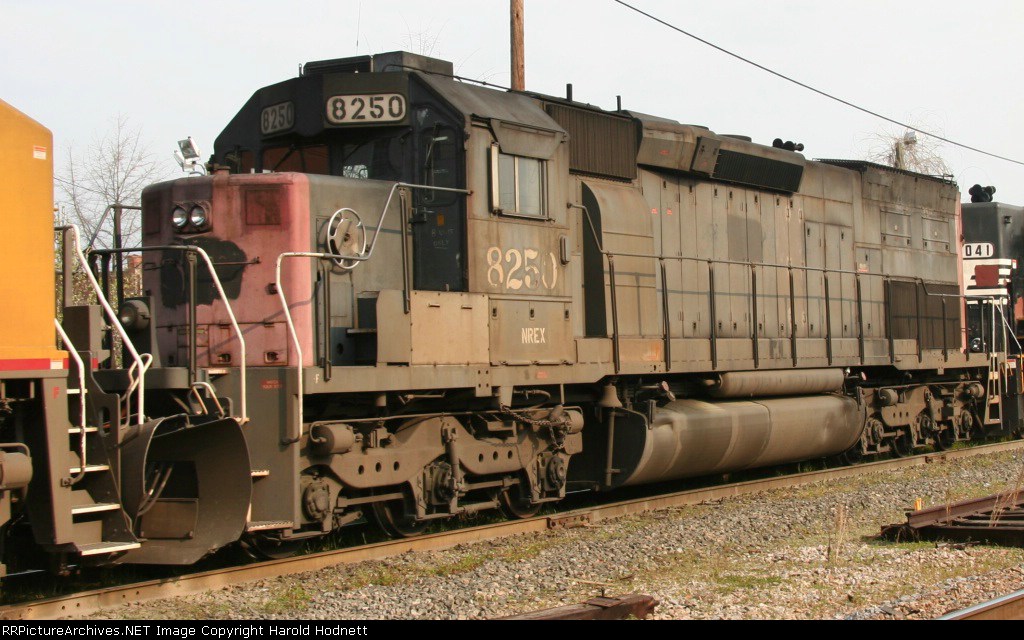 NREX 8250 heads out of town on NS train 349